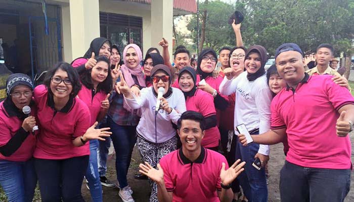 Hj Fitriani Manurung