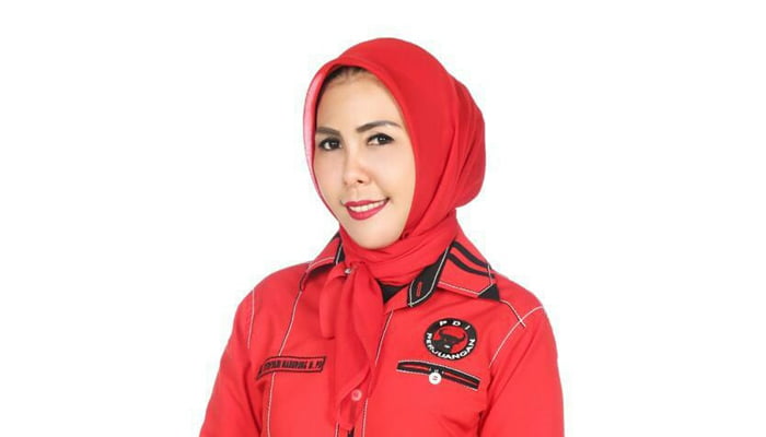 Hj. Fitriani Manurung
