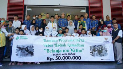 100 anak yatim belanja kebutuhan lebaran