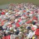Penampungan sampah di kali CBL