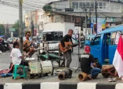 Seniman Jalanan Memaknai Kemerdekaan masih Banyak Masyarakat yang Sengsara pelukis jalanan