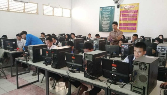 Pemanfaatan Teknologi Cisco dalam Meningkatkan Efisiensi Jaringan dan Pembelajaran di SMK Bina Mandiri